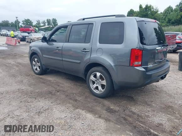 2013 Honda Pilot EX-L with VIN 5FNYF4H74DB030491, listed as a IAAI auction lot 43058771 with 172,998 mi miles and . Bid and sale history available at DreamBid. Image 3.