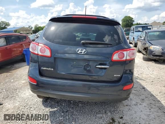 2012 Hyundai Santa Fe Limited with VIN 5XYZK4AG7CG146883, listed as a Copart auction lot 62164205 with 166,910 mi miles and Salvage title. Bid and sale history available at DreamBid. Image 6.