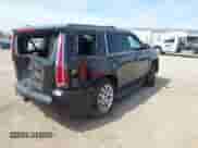 2015 Chevrolet Tahoe LT with VIN 1GNSKBKC9FR158211, listed as a IAAI auction lot 43094500 with 221,133 mi miles and . Bid and sale history available at DreamBid. Image 4.