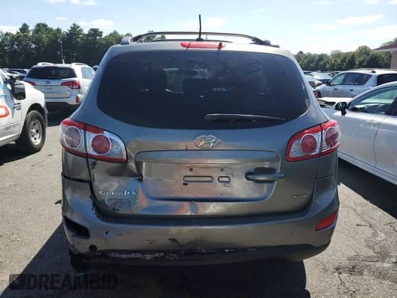 2012 Hyundai Santa Fe SE с VIN 5XYZHDAG6CG141768, выставлен на аукционе Copart как лот 80256625 с пробегом 111 731 миль миль и Списание • Salvage title. История ставок и продаж доступна на DreamBid. Изображение 6.