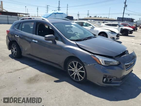 2018 Subaru Impreza Limited с VIN 4S3GTAU64J3706902, выставлен на аукционе Copart как лот 70543955 с пробегом 54 627 миль миль и Списание • Salvage title. История ставок и продаж доступна на DreamBid. Изображение 4.