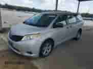 2014 Toyota Sienna L with VIN 5TDZK3DC0ES513289, listed as a Copart auction lot 69385975 with 340,709 mi miles and Clean title. Bid and sale history available at DreamBid. Image 1.