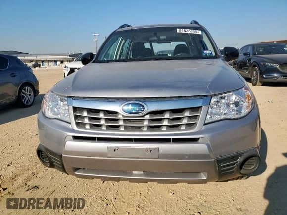 2012 Subaru Forester X z VIN JF2SHBBC6CH410331, wystawiony jako Copart lot #84626595 z przebiegiem 81 661 mil mil oraz Szkoda całkowita • Salvage title. Historia ofert i sprzedaży dostępna na DreamBid. Obrazek 5.