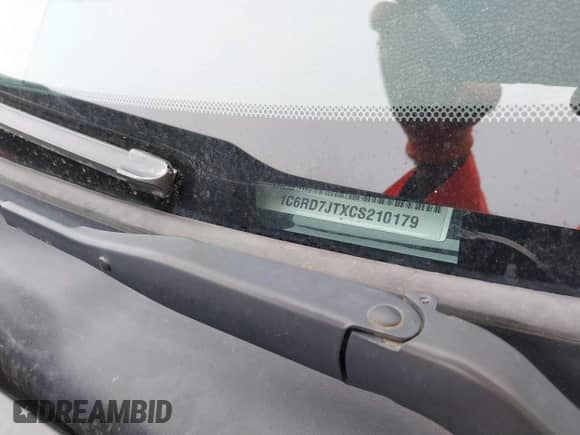 2012 Ram 1500 Laramie z VIN 1C6RD7JTXCS210179, wystawiony jako IAAI lot #41706422 z przebiegiem 125 960 mil mil oraz . Historia ofert i sprzedaży dostępna na DreamBid. Obrazek 9.