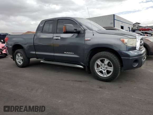 2007 Toyota Tundra Limited z VIN 5TFRV58137X020232, wystawiony jako Copart lot #86535285 z przebiegiem 176 818 mil mil oraz Szkoda całkowita • Salvage title. Historia ofert i sprzedaży dostępna na DreamBid. Obrazek 4.