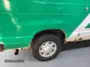 2011 Ford Econoline Cargo Commercial with VIN 1FTNE2EL2BDA70911, listed as a IAAI auction lot 43563678 with 148,036 mi miles and . Bid and sale history available at DreamBid. Image 21.