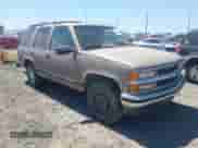 1996 Chevrolet Tahoe with VIN 1GNEK13R9TJ313571, listed as a IAAI auction lot 42768008 with 220,143 mi miles and . Bid and sale history available at DreamBid. Image 1.