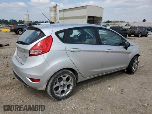 2012 Ford Fiesta SES with VIN 3FADP4FJ3CM173961, listed as a Copart auction lot 59742935 with Not provided miles and Salvage title. Bid and sale history available at DreamBid. Image 3.
