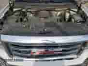 2014 GMC Sierra 1500 SLE z VIN 3GTU2UEC6EG251713, wystawiony jako Copart lot #82122335 z przebiegiem 235 756 mil mil oraz Szkoda całkowita • Salvage title. Historia ofert i sprzedaży dostępna na DreamBid. Obrazek 11.