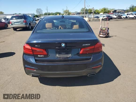 2018 BMW 5 Series 540i xDrive z VIN WBAJE7C54JG891650, wystawiony jako Copart lot #80089755 z przebiegiem Nie podano mil oraz Szkoda całkowita • Salvage title. Historia ofert i sprzedaży dostępna na DreamBid. Obrazek 6.