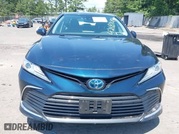 2021 Toyota Camry Hybrid XLE with VIN 4T1F31AK3MU554067, listed as a IAAI auction lot 42681018 with 53,630 mi miles and . Bid and sale history available at DreamBid. Image 12.
