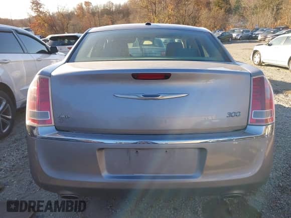 2013 Chrysler 300 with VIN 2C3CCARG0DH595416, listed as a IAAI auction lot 40722790 with 110,377 mi miles and . Bid and sale history available at DreamBid. Image 16.