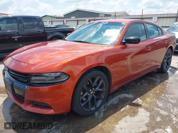 2021 Dodge Charger SXT with VIN 2C3CDXBG0MH532133, listed as a IAAI auction lot 43052102 with 165,802 mi miles and . Bid and sale history available at DreamBid. Image 2.