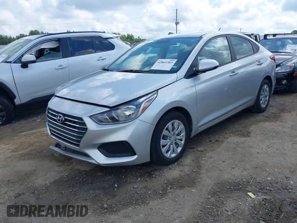 2021 Hyundai Accent SE with VIN 3KPC24A60ME128852, listed as a IAAI auction lot 42865303 with 95,457 mi miles and . Bid and sale history available at DreamBid. Image 2.