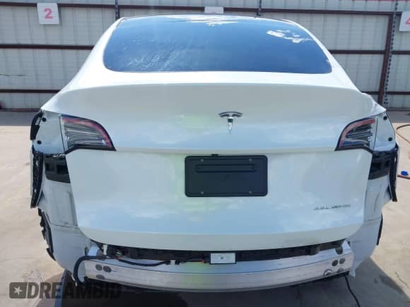 2023 Tesla Model Y Long Range with VIN 7SAYGDEE6PA078790, listed as a IAAI auction lot 43261075 with 20,370 mi miles and . Bid and sale history available at DreamBid. Image 17.