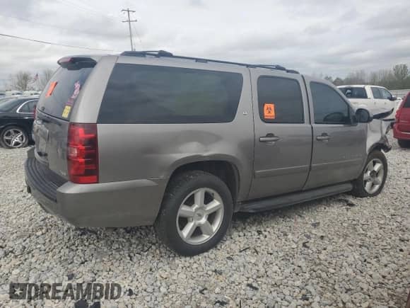 2008 Chevrolet Suburban 2LT z VIN 3GNFK16398G145208, wystawiony jako Copart lot #54560765 z przebiegiem Nie podano mil oraz Czysty tytuł • Clean title. Historia ofert i sprzedaży dostępna na DreamBid. Obrazek 3.