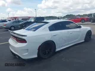 2018 Dodge Charger SRT Hellcat z VIN 2C3CDXL92JH220486, wystawiony jako IAAI lot #42984332 z przebiegiem 59 595 mil mil oraz . Historia ofert i sprzedaży dostępna na DreamBid. Obrazek 4.