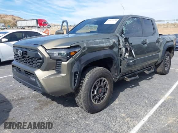 2024 Toyota Tacoma SR5 with VIN 3TMLB5JN6RM027745, listed as a IAAI auction lot 41479793 with 16,376 mi miles and . Bid and sale history available at DreamBid. Image 20.