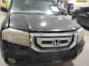 2011 Honda Pilot EX with VIN 5FNYF4H46BB014571, listed as a IAAI auction lot 43572141 with 243,613 mi miles and . Bid and sale history available at DreamBid. Image 11.