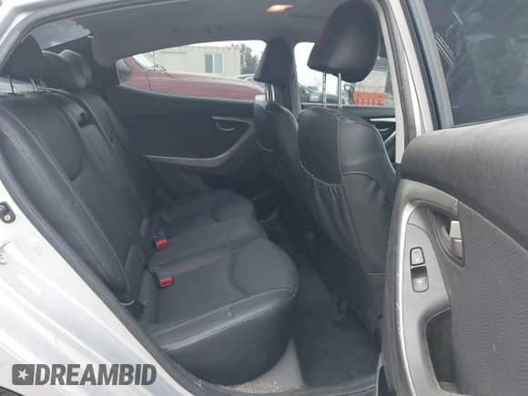 2013 Hyundai Elantra GLS z VIN KMHDH4AE6DU779474, wystawiony jako IAAI lot #42569044 z przebiegiem 95 106 mil mil oraz . Historia ofert i sprzedaży dostępna na DreamBid. Obrazek 8.