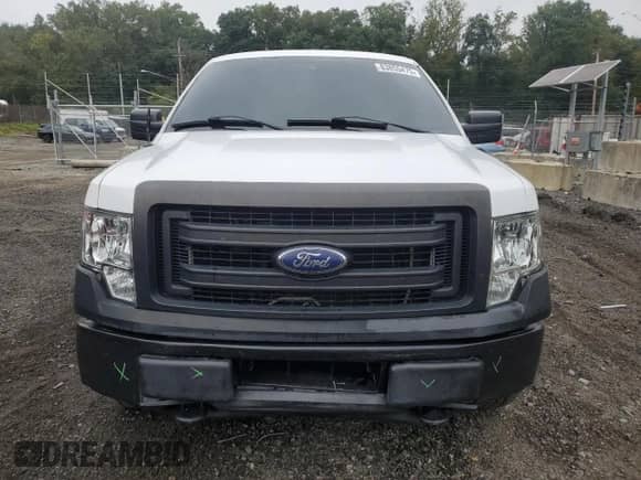 2014 Ford F-150 STX with VIN 1FTFW1EF9EKG53921, listed as a Copart auction lot 83855475 with 148,232 mi miles and Salvage title. Bid and sale history available at DreamBid. Image 5.