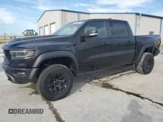 2022 Ram 1500 TRX z VIN 1C6SRFU91NN377299, wystawiony jako Copart lot #86686205 z przebiegiem 138 313 mil mil oraz Czysty tytuł • Clean title. Historia ofert i sprzedaży dostępna na DreamBid. Obrazek 1.