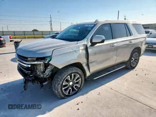 2023 Chevrolet Tahoe LT z VIN 1GNSCNKD2PR281647, wystawiony jako Copart lot #67909195 z przebiegiem 73 186 mil mil oraz Szkoda całkowita • Salvage title. Historia ofert i sprzedaży dostępna na DreamBid. Obrazek 1.