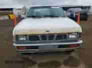 1997 Nissan Frontier XE with VIN 1N6SD16S8VC426940, listed as a Copart auction lot 55860235 with 242,265 mi miles and Salvage title. Bid and sale history available at DreamBid. Image 5.