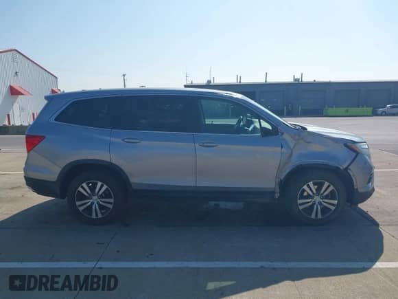 2017 Honda Pilot EX-L with VIN 5FNYF6H77HB069321, listed as a IAAI auction lot 42880282 with 110,987 mi miles and . Bid and sale history available at DreamBid. Image 13.