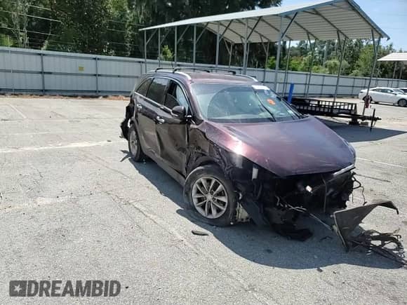 2016 Kia Sorento LX with VIN 5XYPG4A37GG075065, listed as a Copart auction lot 71803935 with 105,799 mi miles and Salvage title. Bid and sale history available at DreamBid. Image 14.