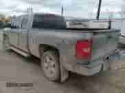 2009 Chevrolet Silverado 1500 LTZ with VIN 1GCEK39J49Z260388, listed as a Copart auction lot 57363865 with 151,689 mi miles and Salvage title. Bid and sale history available at DreamBid. Image 2.