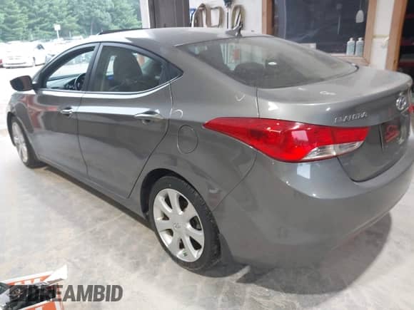 2013 Hyundai Elantra GLS z VIN 5NPDH4AE3DH240602, wystawiony jako IAAI lot #42725541 z przebiegiem 103 774 mil mil oraz . Historia ofert i sprzedaży dostępna na DreamBid. Obrazek 3.