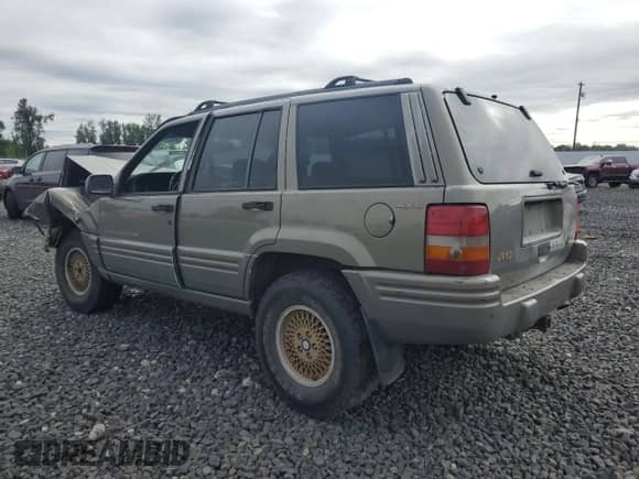1998 Jeep Grand Cherokee Limited с VIN 1J4GZ78Y4WC216880, выставлен на аукционе Copart как лот 64325945 с пробегом Не указан миль и Списание • Salvage title. История ставок и продаж доступна на DreamBid. Изображение 2.
