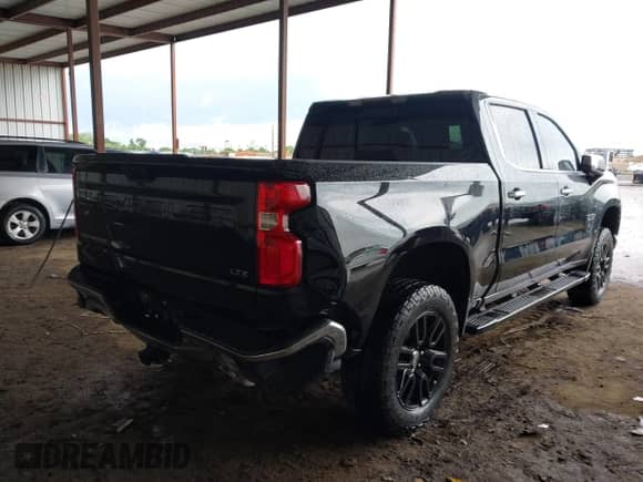2021 Chevrolet Silverado 1500 LTZ with VIN 3GCUYGET2MG143300, listed as a IAAI auction lot 42164480 with 95,236 mi miles and . Bid and sale history available at DreamBid. Image 4.