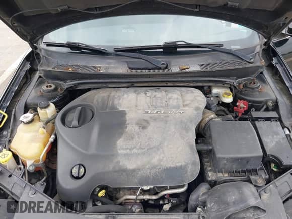 2014 Chrysler 200 LX with VIN 1C3CCBAG5EN157680, listed as a IAAI auction lot 42463846 with 166,482 mi miles and . Bid and sale history available at DreamBid. Image 10.