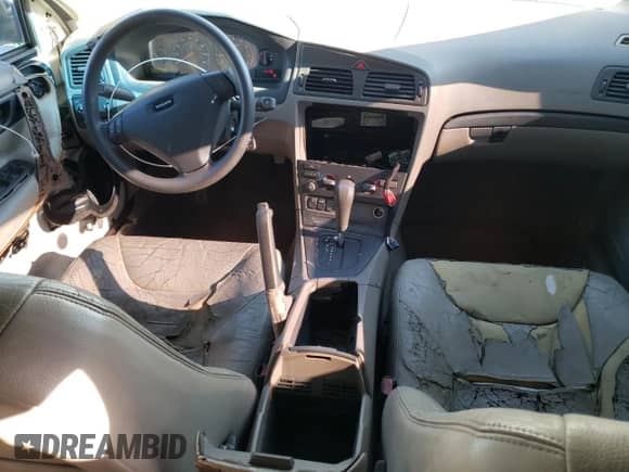 2001 Volvo S60 с VIN YV1RS61R412084860, выставлен на аукционе Copart как лот 77227144 с пробегом 170 853 миль миль и На запчасти • Non repairable. История ставок и продаж доступна на DreamBid. Изображение 8.