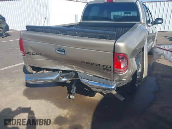 2004 Dodge Dakota SLT with VIN 1D7HL48N44S504617, listed as a IAAI auction lot 41955400 with 196,096 mi miles and . Bid and sale history available at DreamBid. Image 6.
