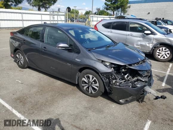 2017 Toyota Prius Premium with VIN JTDKARFPXH3066774, listed as a Copart auction lot 82438865 with 69,675 mi miles and Salvage title. Bid and sale history available at DreamBid. Image 4.