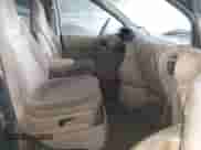 1998 Dodge Caravan z VIN 2B4GP25R4WR724105, wystawiony jako IAAI lot #43292275 z przebiegiem 214 897 mil mil oraz . Historia ofert i sprzedaży dostępna na DreamBid. Obrazek 5.