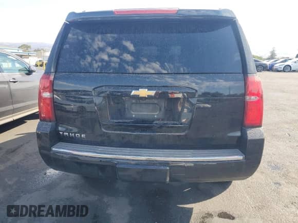 2016 Chevrolet Tahoe LTZ with VIN 1GNSKCKC9GR117682, listed as a Copart auction lot 81855485 with 72,507 mi miles and Salvage title. Bid and sale history available at DreamBid. Image 6.