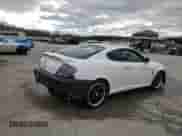 2003 Hyundai Tiburon with VIN KMHHM65D53U042971, listed as a Copart auction lot 86919434 with 202,250 mi miles and Salvage title. Bid and sale history available at DreamBid. Image 3.