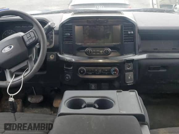 2023 Ford F-150 XL z VIN 1FTEX1CP2PKD79307, wystawiony jako Copart lot #55232125 z przebiegiem 69 084 mil mil oraz Szkoda całkowita • Salvage title. Historia ofert i sprzedaży dostępna na DreamBid. Obrazek 8.