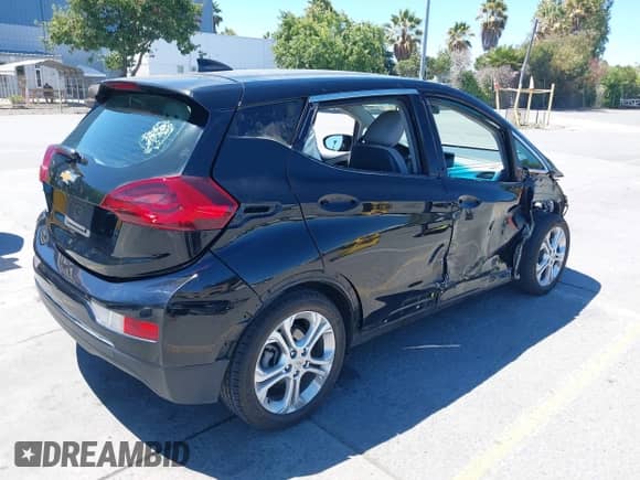 2020 Chevrolet Bolt EV LT with VIN 1G1FY6S04L4114947, listed as a IAAI auction lot 43019210 with 122,619 mi miles and . Bid and sale history available at DreamBid. Image 4.