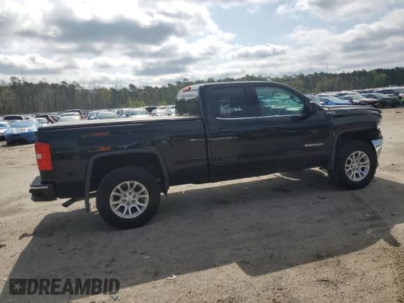 2018 GMC Sierra 1500 SLE с VIN 1GTV2MEC2JZ365755, выставлен на аукционе Copart как лот 51484355 с пробегом 62 570 миль миль и Списание • Salvage title. История ставок и продаж доступна на DreamBid. Изображение 3.