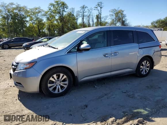 2016 Honda Odyssey EX with VIN 5FNRL5H44GB084662, listed as a Copart auction lot 87011705 with 87,495 mi miles and Salvage title. Bid and sale history available at DreamBid. Image 1.