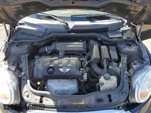 2013 MINI Hardtop with VIN WMWSU3C51DT681423, listed as a Copart auction lot 61310795 with 97,510 mi miles and Salvage title. Bid and sale history available at DreamBid. Image 11.