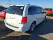 2019 Dodge Grand Caravan SXT with VIN 2C4RDGCG1KR672042, listed as a IAAI auction lot 41213183 with 160,019 mi miles and . Bid and sale history available at DreamBid. Image 4.