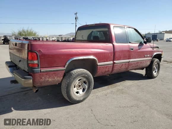 1996 Dodge 1500 с VIN 3B7HF13YXTG123975, выставлен на аукционе Copart как лот 73549874 с пробегом 225 056 миль миль и Списание • Salvage title. История ставок и продаж доступна на DreamBid. Изображение 3.
