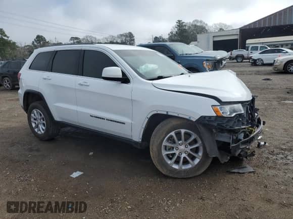 2022 Jeep Grand Cherokee Laredo E with VIN 1C4RJFAG0NC124987, listed as a Copart auction lot 46229435 with 43,786 mi miles and Salvage title. Bid and sale history available at DreamBid. Image 4.