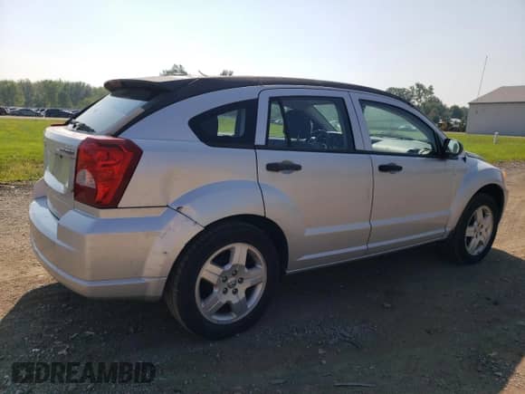 2011 Dodge Caliber z VIN 1B3CB1HA3BD296851, wystawiony jako Copart lot #68704655 z przebiegiem 113 601 mil mil oraz Czysty tytuł • Clean title. Historia ofert i sprzedaży dostępna na DreamBid. Obrazek 3.